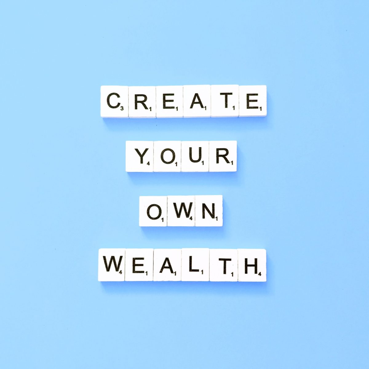 Create your own wealth. Quote. Quotes. Scrabble.